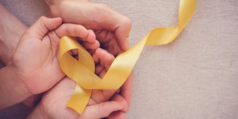لماذا اختير الشريط الذهبي شعاراً للتوعية بسرطان الأطفال؟
