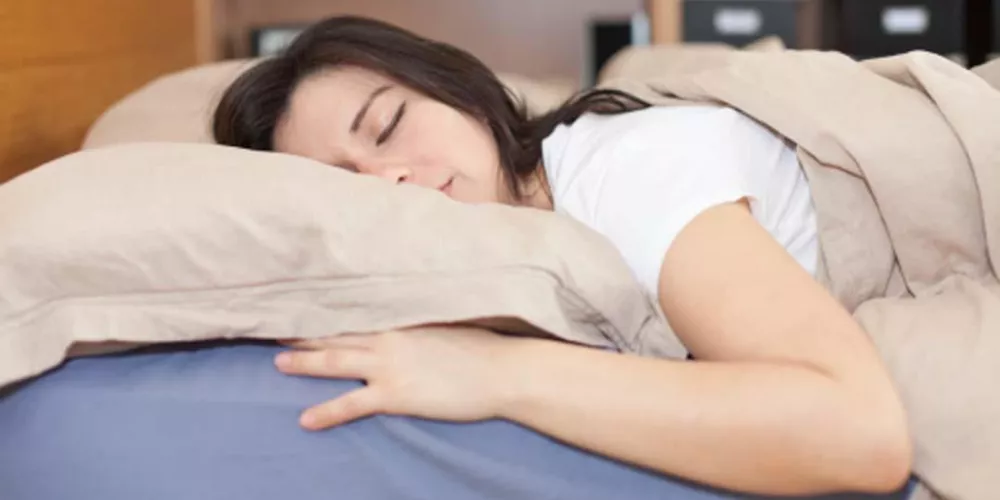 اضرار النوم على البطن للحامل